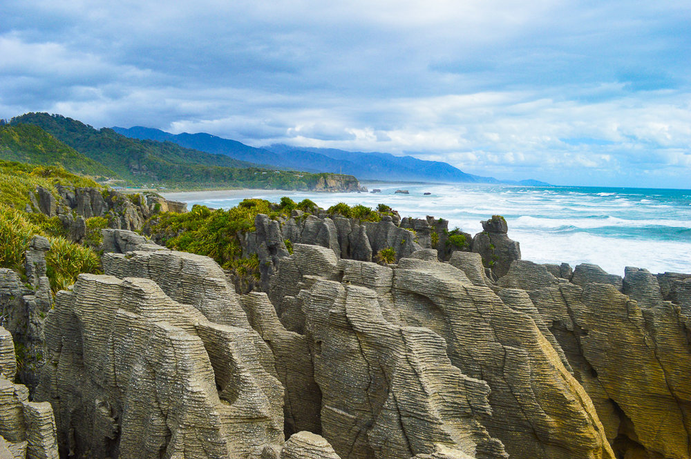 layered geological rock formations in New Zealand
