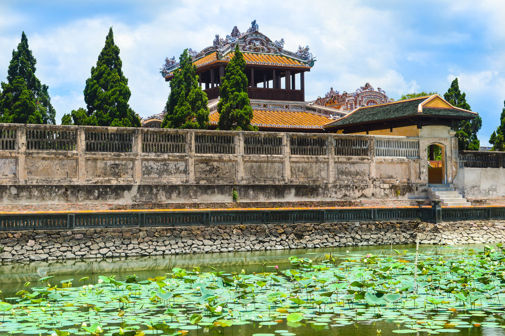 waterlilly pond with ancient palace in background