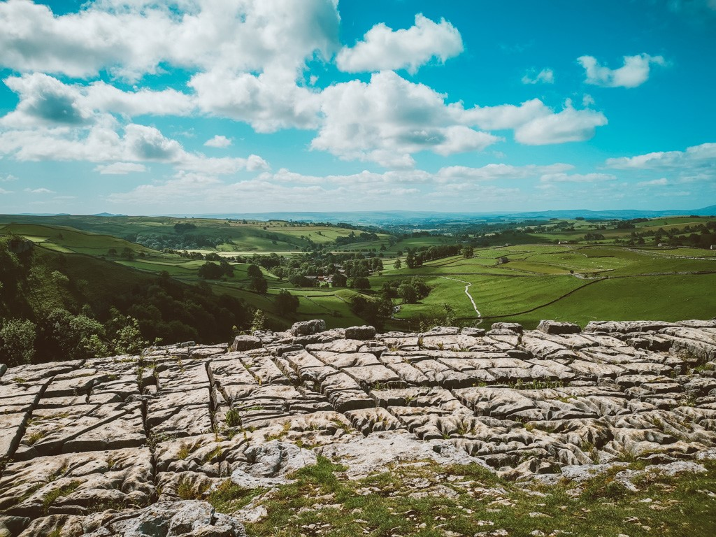 malham cove in Yorkshire with blue sky